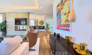 Spectaculaire eigentijdse luxe villa te koop, met prachtig zeezicht en een eerstelijns frontlinie golf positie in Benahavis - Marbella 36685 