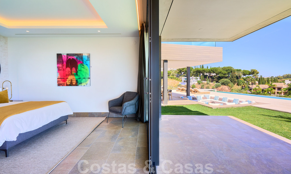 Spectaculaire eigentijdse luxe villa te koop, met prachtig zeezicht en een eerstelijns frontlinie golf positie in Benahavis - Marbella 36694