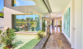 Spectaculaire eigentijdse luxe villa te koop, met prachtig zeezicht en een eerstelijns frontlinie golf positie in Benahavis - Marbella 36702 