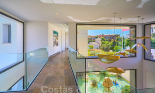 Spectaculaire eigentijdse luxe villa te koop, met prachtig zeezicht en een eerstelijns frontlinie golf positie in Benahavis - Marbella 36705 