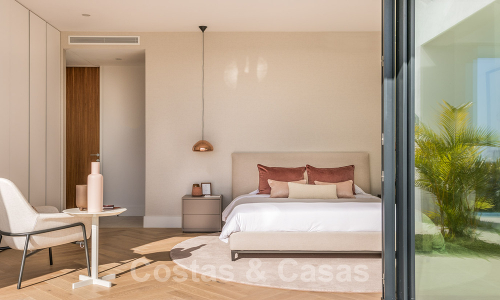 VERKOCHT. Super luxueuze eigentijdse villa met uitzicht op zee en bergen te koop in de Gouden Driehoek van Benahavis, Estepona, Marbella 32020