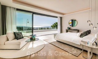 VERKOCHT. Super luxueuze eigentijdse villa met uitzicht op zee en bergen te koop in de Gouden Driehoek van Benahavis, Estepona, Marbella 32026 