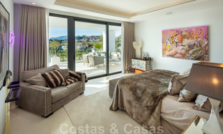 Elegante eigentijdse luxe villa met zeezicht te koop in het gegeerde Nueva Andalucia, Marbella 20887 