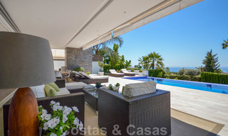 Moderne luxe villa met panoramisch zeezicht te koop in het prestigieuze Golden Mile district van Marbella 20998 