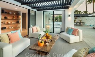 Weelderige modern-mediterrane luxe villa te koop, direct aan de golfbaan in Nueva Andalucia, Marbella 21523 