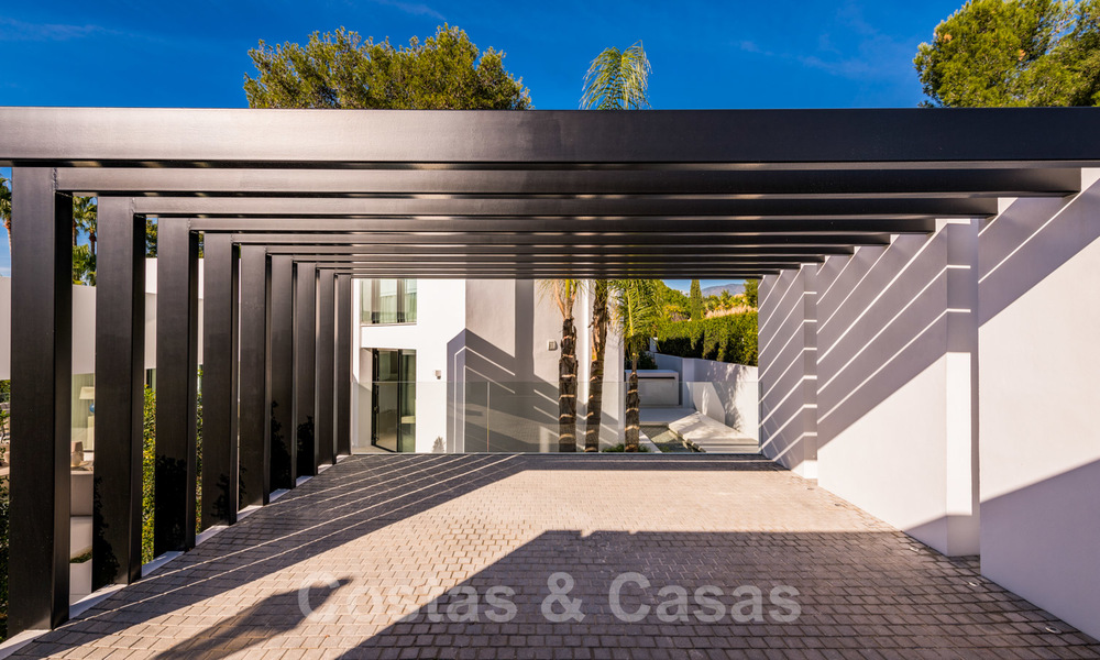 Zeer stijlvolle eigentijdse luxe villa te koop in het hart van de Golf Vallei, instapklaar - Nueva Andalucia, Marbella 21834