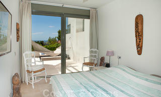 Modern eerstelijns golf appartement met prachtig golf- en zeezicht te koop in Los Flamingos Golf in Marbella - Benahavis 25139 