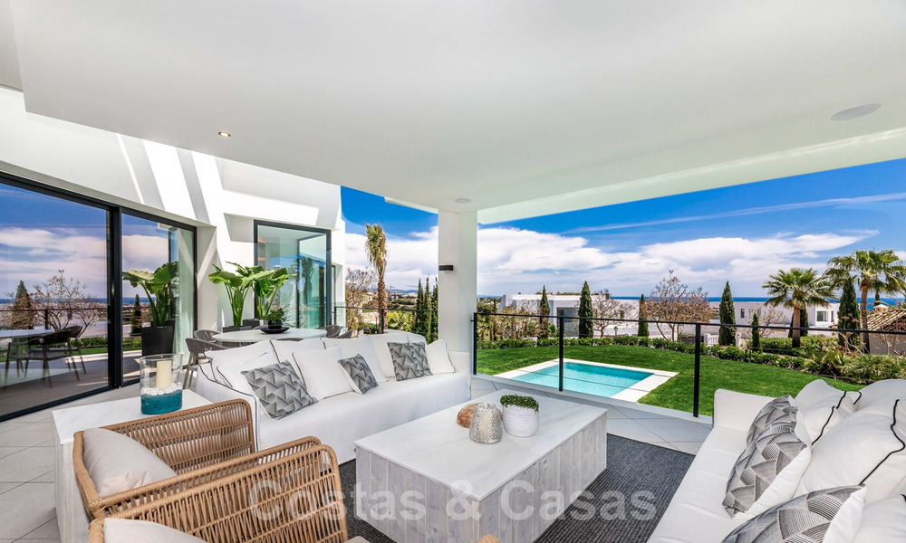 Moderne villa met zeezicht te koop in Los Flamingos Golf in Marbella - Benahavis. Verlaagd in prijs. 26005
