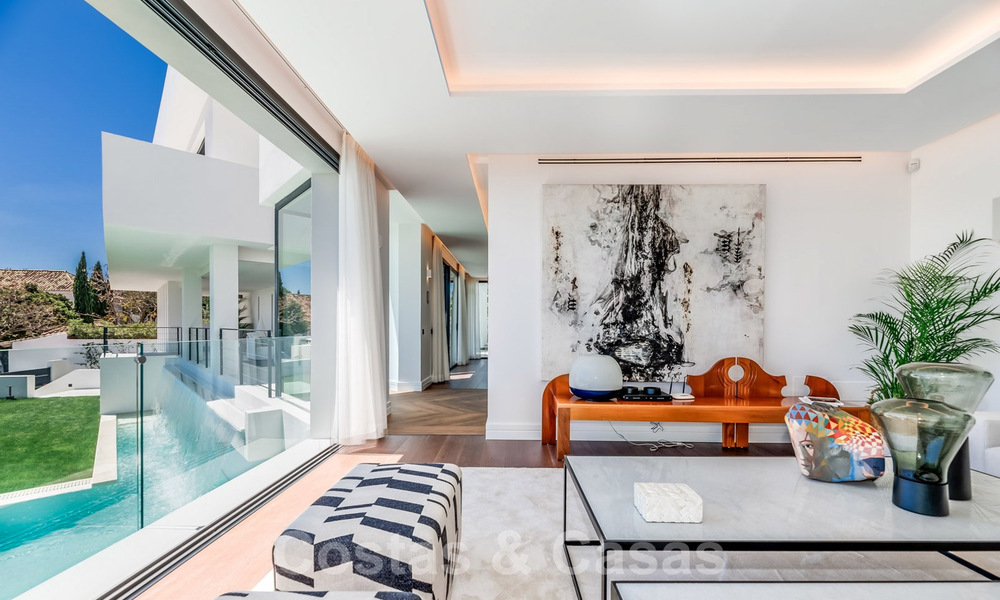 Moderne villa met zeezicht te koop in Los Flamingos Golf in Marbella - Benahavis. Verlaagd in prijs. 26009