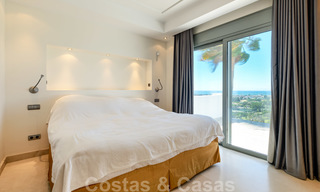 Moderne villa met panoramisch golf- en zeezicht te koop in Los Flamingos Golf in Marbella - Benahavis 26041 