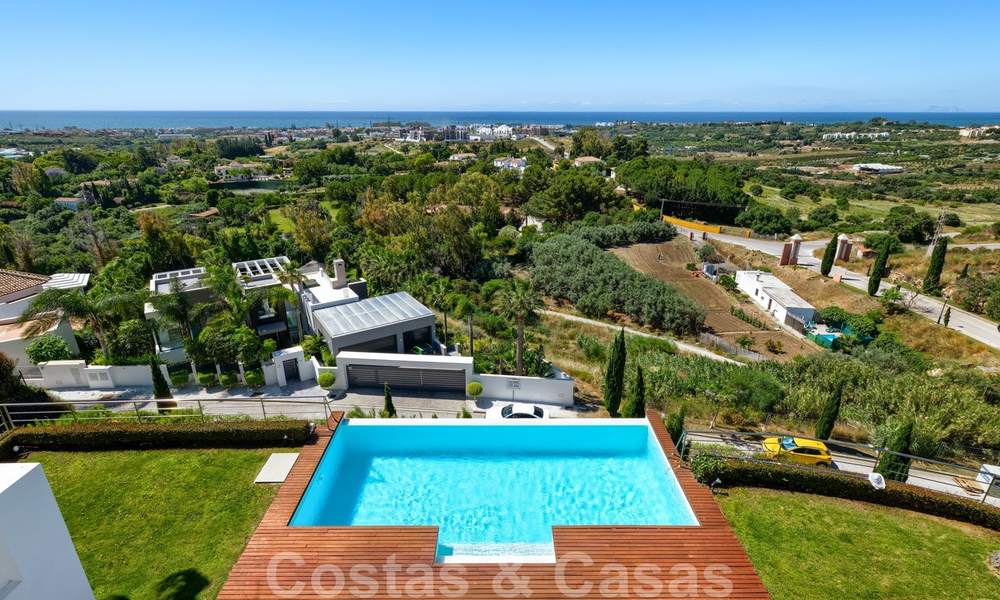 Moderne villa met panoramisch golf- en zeezicht te koop in Los Flamingos Golf in Marbella - Benahavis 26055