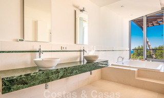Moderne luxe hoekwoning met zeezicht te koop in het exclusieve Sierra Blanca, Marbella 27138 