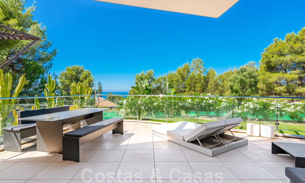 Moderne luxe hoekwoning met zeezicht te koop in het exclusieve Sierra Blanca, Marbella 27147