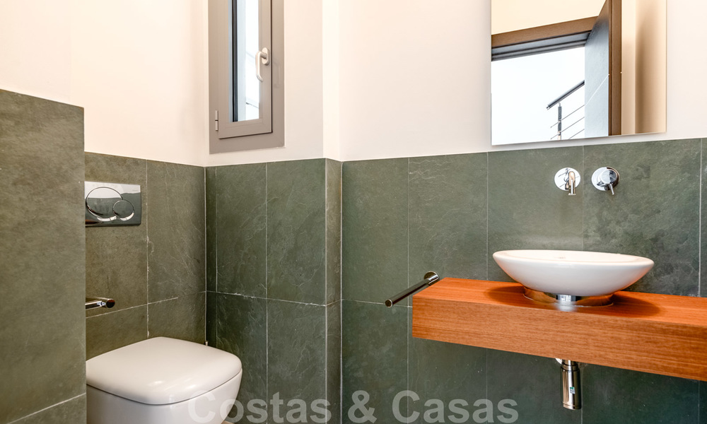 Moderne luxe hoekwoning met zeezicht te koop in het exclusieve Sierra Blanca, Marbella 27149
