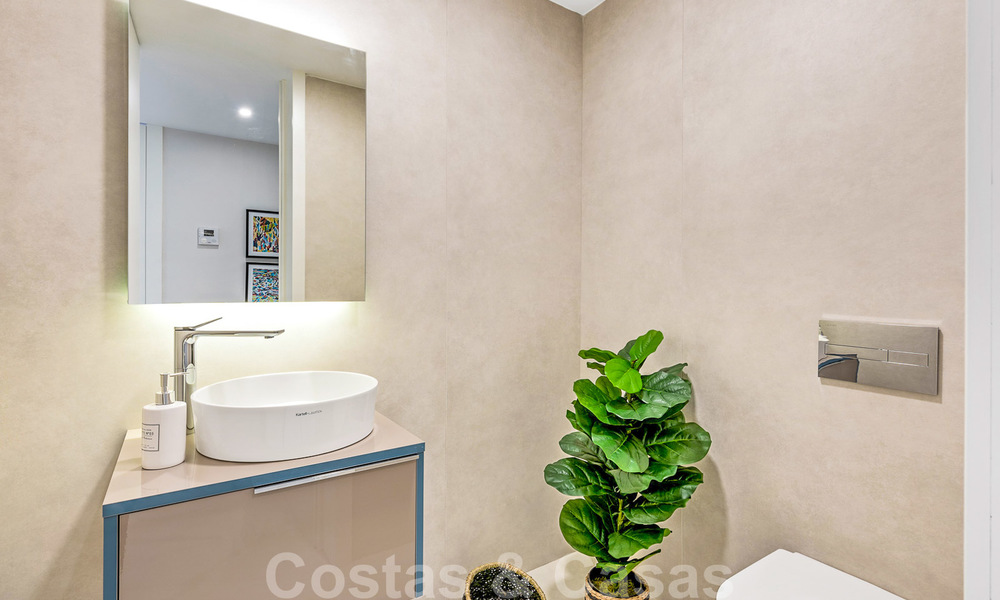Instapklare sensationele moderne luxe eerstelijns strand appartementen te koop in Estepona, Costa del Sol 27840