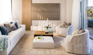 Instapklare moderne luxe eerstelijnsstrand villa te koop in een exclusief complex in Estepona, Costa del Sol 28213 
