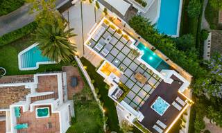 Toplokatie, moderne luxe villa te koop in een gerenommeerde urbanisatie aan het strand op de Golden Mile in Marbella. Instapklaar. 57218 