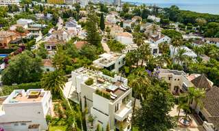 Toplokatie, moderne luxe villa te koop in een gerenommeerde urbanisatie aan het strand op de Golden Mile in Marbella. Instapklaar. 57230 