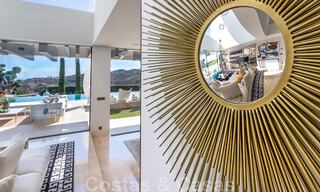 Instapklare, nieuwe moderne designvilla te koop in een kampioenschaps golfresort in Mijas, Costa del Sol 31895 