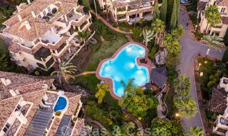 Ruim luxe penthouse te koop aan de golfbaan in Nueva Andalucia, Marbella met panoramisch uitzicht 32082 