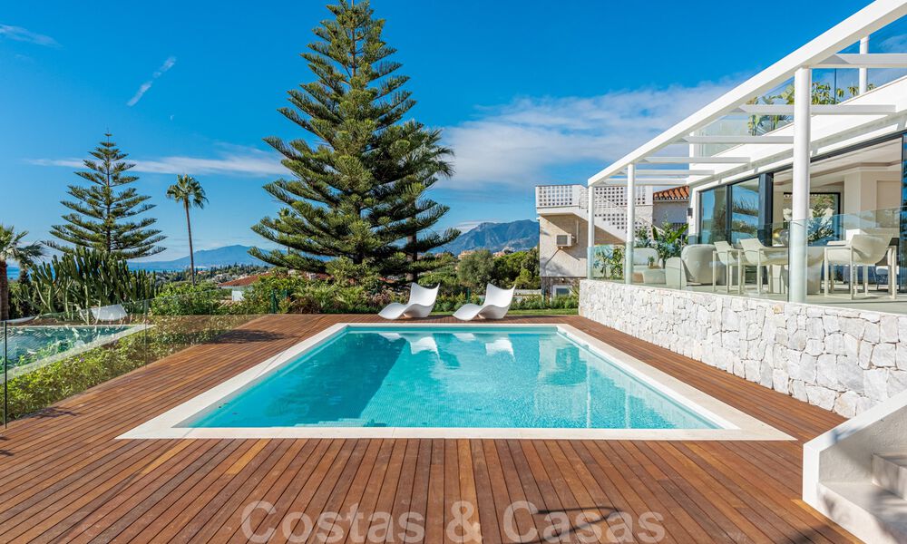 Elegante en ruime moderne nieuwe villa te koop met prachtig panoramisch zeezicht in Elviria, Marbella 32322