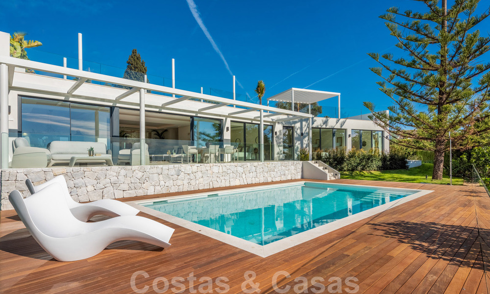 Elegante en ruime moderne nieuwe villa te koop met prachtig panoramisch zeezicht in Elviria, Marbella 32331