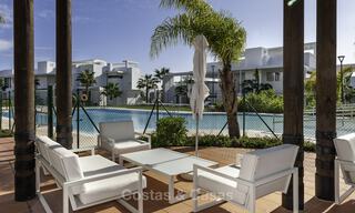 Modern 3 slaapkamer appartement te koop met zeezicht in een eerstelijns golf complex in Benahavis - Marbella 32559 
