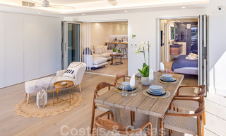 Prachtig eigentijds gerenoveerd, zuid gericht, luxe tuinappartement te koop in Nueva Andalucia, Marbella 32860 