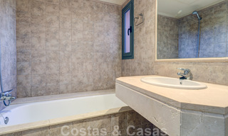 Luxe appartement te koop met privétuin en zeezicht in een luxueus vijfsterren golfresort in Benahavis - Marbella 33334 