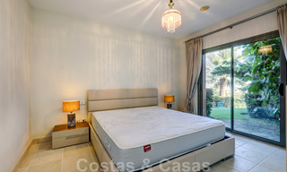 Luxe appartement te koop met privétuin en zeezicht in een luxueus vijfsterren golfresort in Benahavis - Marbella 33341 