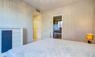 Luxe appartement te koop met privétuin en zeezicht in een luxueus vijfsterren golfresort in Benahavis - Marbella 33343 