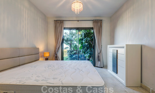 Luxe appartement te koop met privétuin en zeezicht in een luxueus vijfsterren golfresort in Benahavis - Marbella 33345 