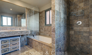 Luxe appartement te koop met privétuin en zeezicht in een luxueus vijfsterren golfresort in Benahavis - Marbella 33346 