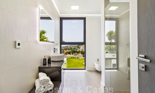 Instapklare exclusieve moderne luxevilla te koop in Benahavis - Marbella met schitterend open uitzicht over de golf en de zee 33516 
