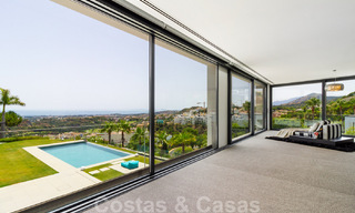 Instapklare exclusieve moderne luxevilla te koop in Benahavis - Marbella met schitterend open uitzicht over de golf en de zee 33522 