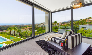 Instapklare exclusieve moderne luxevilla te koop in Benahavis - Marbella met schitterend open uitzicht over de golf en de zee 33523 