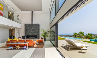Instapklare exclusieve moderne luxevilla te koop in Benahavis - Marbella met schitterend open uitzicht over de golf en de zee 33534 