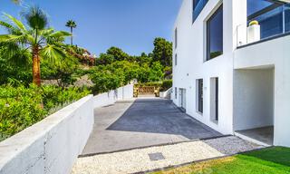 Instapklare exclusieve moderne luxevilla te koop in Benahavis - Marbella met schitterend open uitzicht over de golf en de zee 33557 