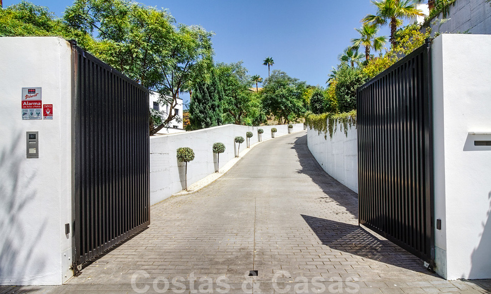 Instapklare exclusieve moderne luxevilla te koop in Benahavis - Marbella met schitterend open uitzicht over de golf en de zee 33561