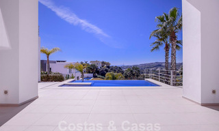 Instapklare, nieuwe moderne luxevilla te koop met zeezicht in Marbella - Benahavis in een gated community 33576 