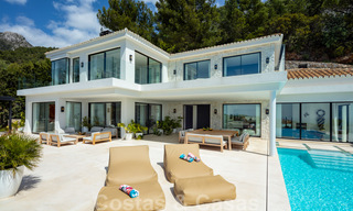 Moderne mediterrane design villa te koop met panoramisch zeezicht in Cascada de Camojan, Golden Mile, Marbella 34309 