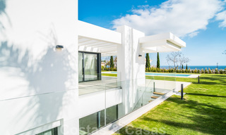 Instapklare, moderne nieuwbouwvilla te koop met zeezicht in vijfsterren golfresort in Marbella - Benahavis 34543 