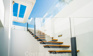 Instapklare, moderne nieuwbouwvilla te koop met zeezicht in vijfsterren golfresort in Marbella - Benahavis 34549 