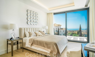 Instapklare, moderne nieuwbouwvilla te koop met zeezicht in vijfsterren golfresort in Marbella - Benahavis 34560 