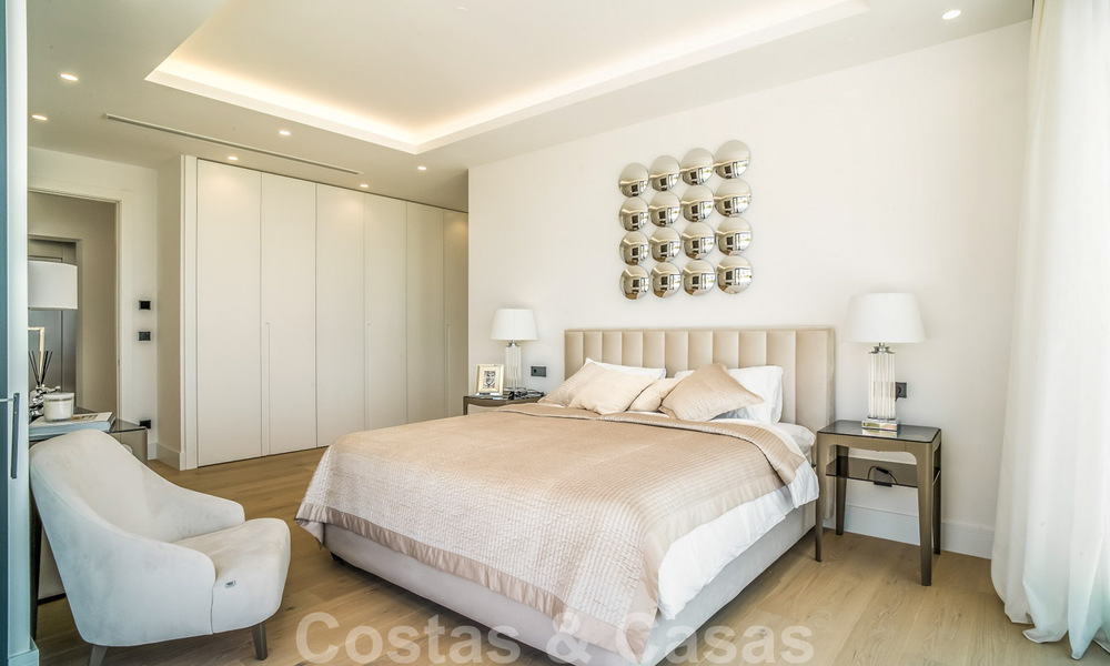 Instapklare, moderne nieuwbouwvilla te koop met zeezicht in vijfsterren golfresort in Marbella - Benahavis 34561