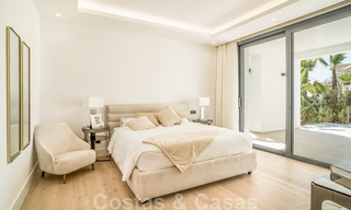Instapklare, moderne nieuwbouwvilla te koop met zeezicht in vijfsterren golfresort in Marbella - Benahavis 34570 