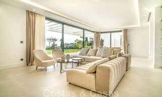 Instapklare, moderne nieuwbouwvilla te koop met zeezicht in vijfsterren golfresort in Marbella - Benahavis 34593 