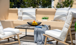 Eigentijds gerenoveerd appartement te koop met ruim terras, zee- en bergzicht in La Quinta golfresort, Benahavis - Marbella 34858 