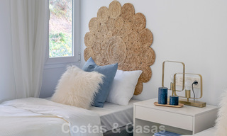 Eigentijds gerenoveerd appartement te koop met ruim terras, zee- en bergzicht in La Quinta golfresort, Benahavis - Marbella 34876 
