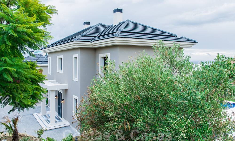 Nieuwe villa te koop in een eigentijdse klassieke stijl met zeezicht in vijfsterren golfresort in Marbella – Benahavis 34923
